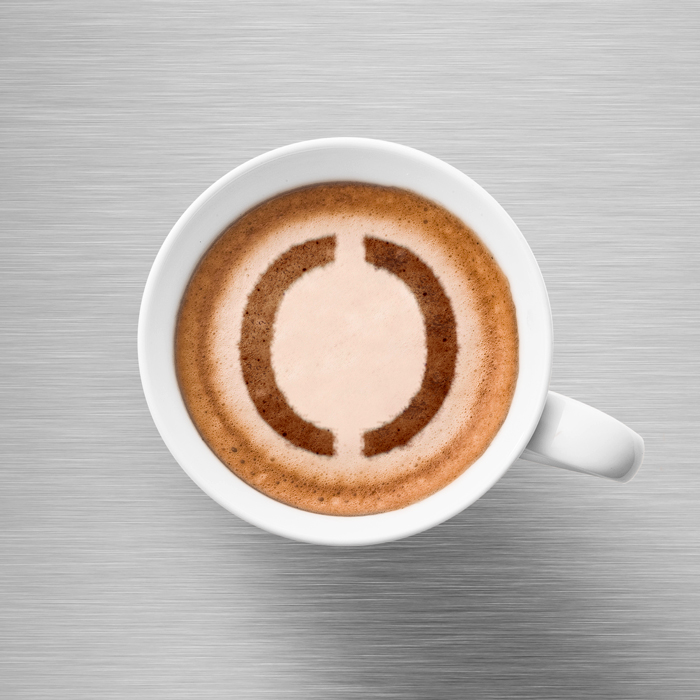 Kunde Brainbow: Symbolbild Tasse Kaffee mit Brainbow-Signet im Kaffeeschaum