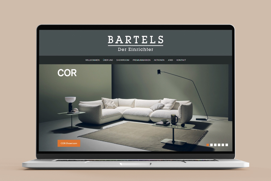 Startseite der Website Bartels auf einem MacBook. Das Grau aus dem Corporate Design wurde auch in Internetseite umgesetzt